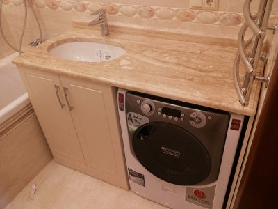 Cupboard with sink for washing machine